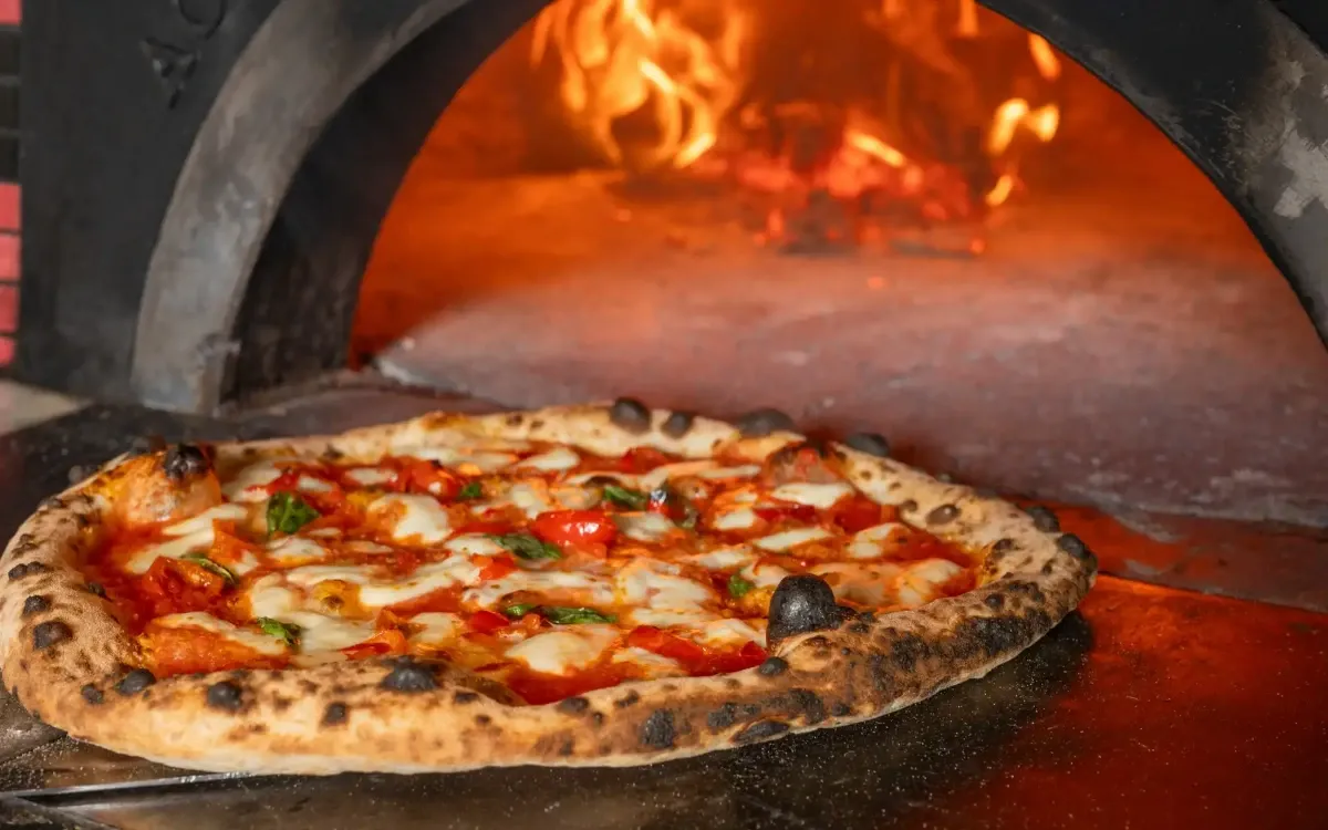 Savor Handcrafted Pizza and Pasta Elevated with Fire and Fresh Flavor